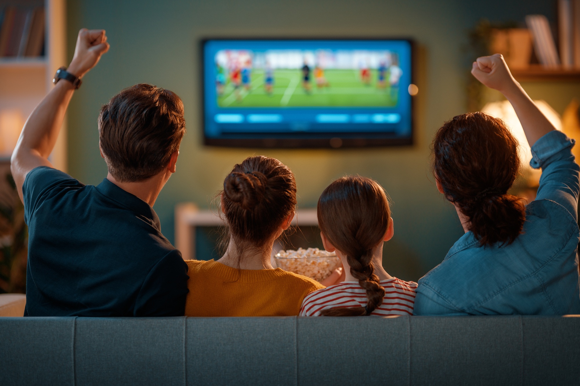 family watching sport at home